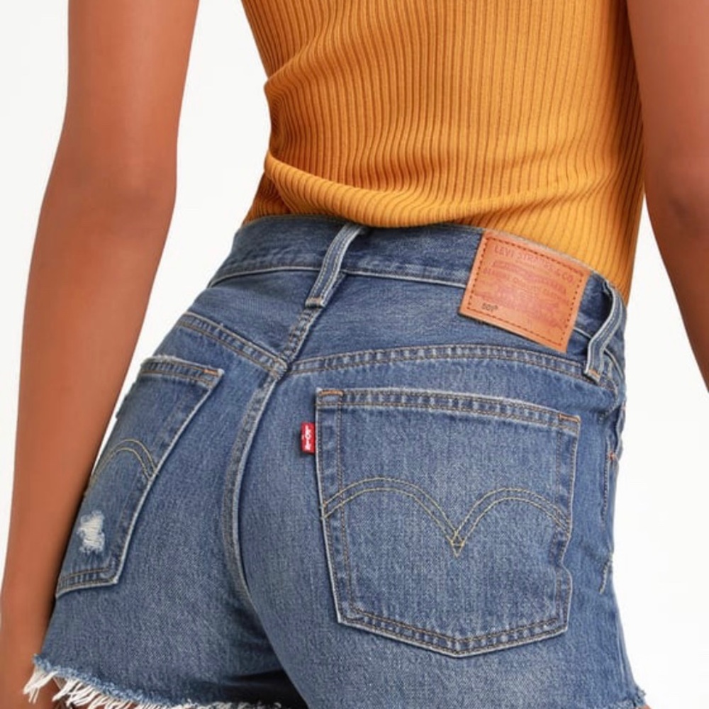 Levi’s 501 medium wash distressed shorts